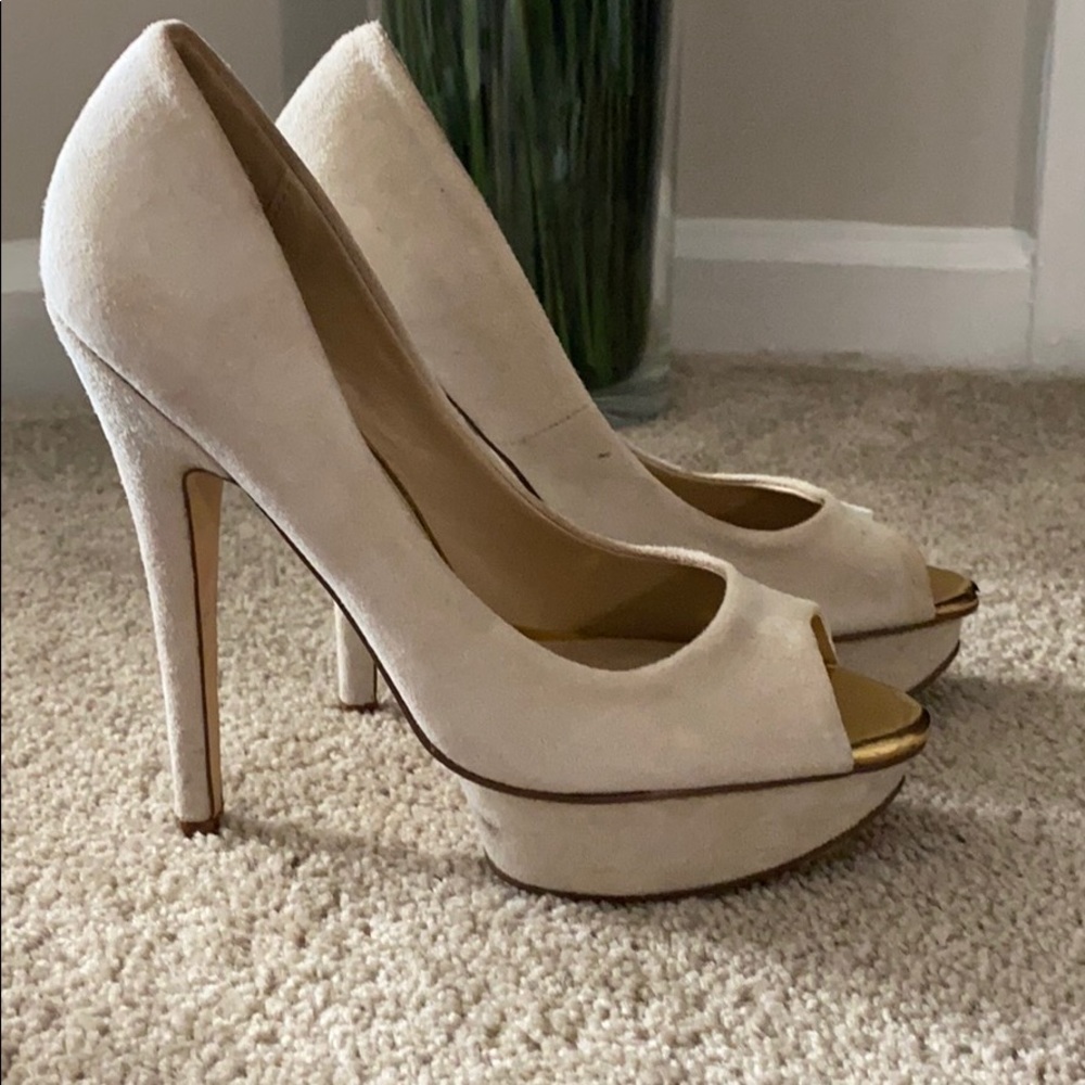 Cream colored heels by Aldo size 39